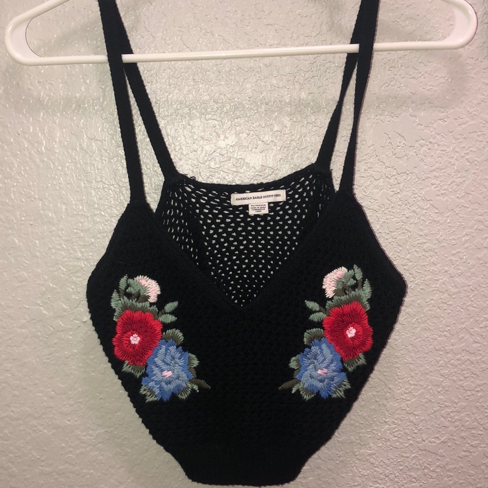A cute yarn crop top with floral designs